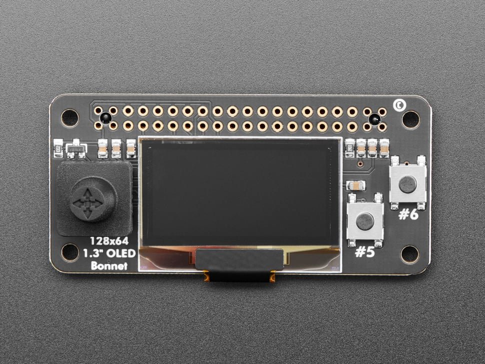 Figure 3 — A homebrew CW trainer's readout — a 128×64 OLED that decodes Morse and prints it. Build one and it reads your own sending back to you, the best practice aid there is. (Adafruit OLED bonnet.)