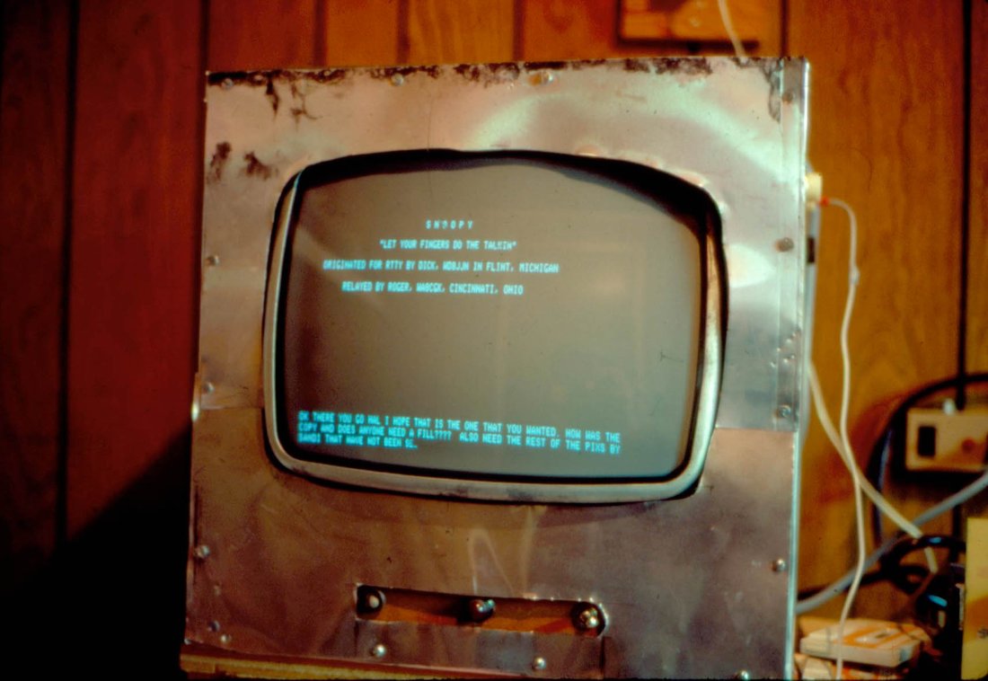 Figure 4 — Real RTTY on a home-built terminal's screen: "THE QUICK BROWN FOX…" above a message "originated for RTTY by Dick … in Flint, Michigan, relayed by Roger … Cincinnati, Ohio." The pangram test and a l…