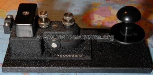 Figure 3 — A U.S. Navy "flameproof" key, a CJB-26003A (made by J. H. Bunnell) — the contacts are totally enclosed under the box at left so a spark can't ignite fumes aboard ship. A deliberate contrast to the …